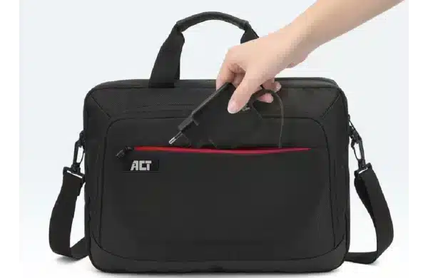 Black laptop bag with a hand placing a charger/adapter into a front pocket.